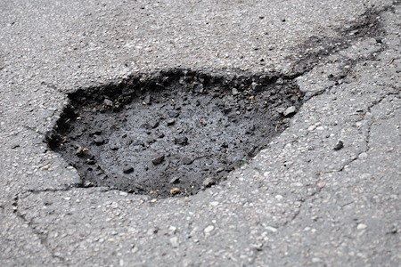 Pot Hole Repair Options for Minnesota Parking Lots (And Which One Lasts Longest)